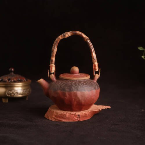 Hand-pressed Swirl Yellow River Pattern Lift-Handle Teapot