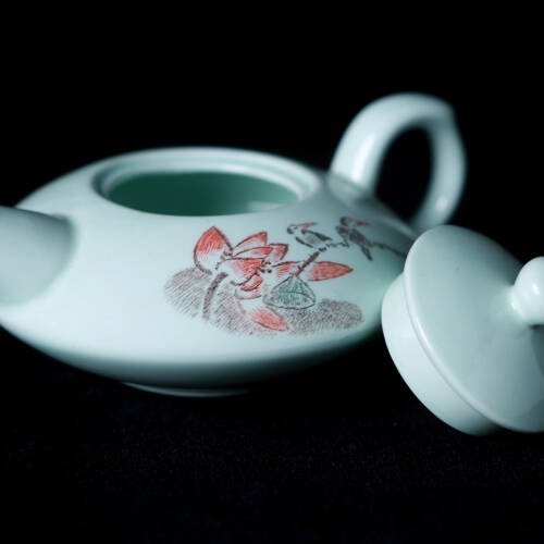 Emerald whispers among the lotuses